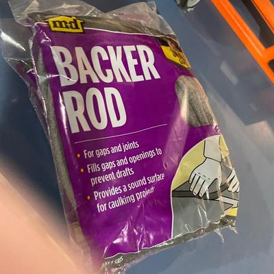 Lot 367 bucket of concrete tools, caulk gun, level, 2 backer rods