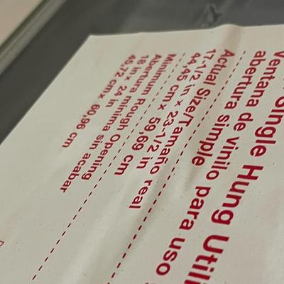 Lot 368 vinyl single hung window - new in package (17.5 x 23.5)