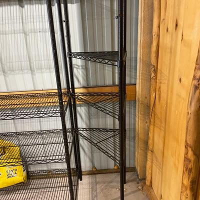 Lot 386 4 shelf metal shelf and three shelf metal corner shelf - as is - shelves missing