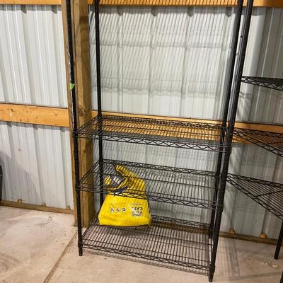 Lot 386 4 shelf metal shelf and three shelf metal corner shelf - as is - shelves missing