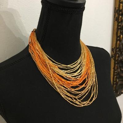 Beautiful vintage glass tube beaded two toned amber glass bead necklace