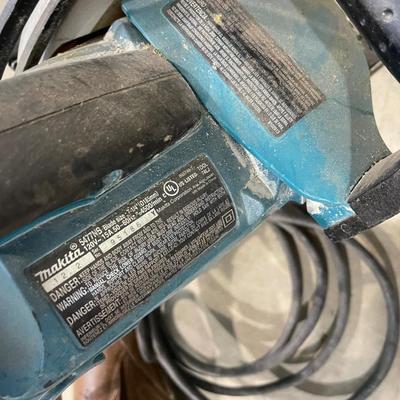 Lot 398 Mikita circular saw and sump pump (not tested)