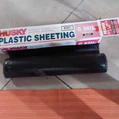 MORE THAN 1/2 A ROLL OF HUSKY PLASTIC SHEETING