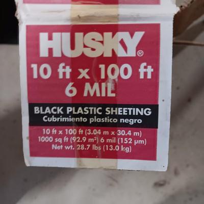 MORE THAN 1/2 A ROLL OF HUSKY PLASTIC SHEETING