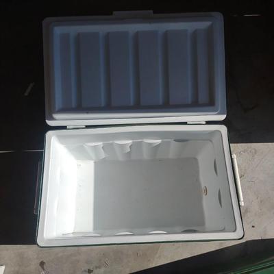 COLEMAN CAMPING STOVE AND A COLEMAN COOLER