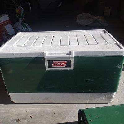 COLEMAN CAMPING STOVE AND A COLEMAN COOLER