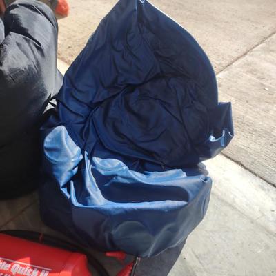 2 SLEEPING BAGS, AIR PUMP AND A COOLER