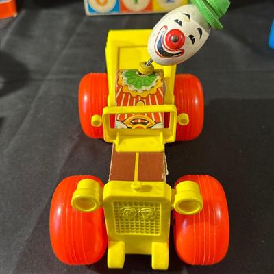Lot of Vintage Fisher Price Toys including Roller Skates!