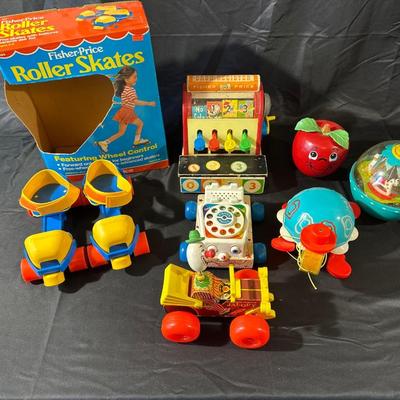 Lot of Vintage Fisher Price Toys including Roller Skates!