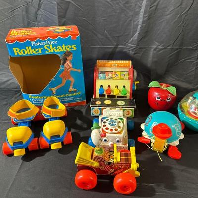 Lot of Vintage Fisher Price Toys including Roller Skates!