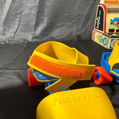 Lot of Vintage Fisher Price Toys including Roller Skates!