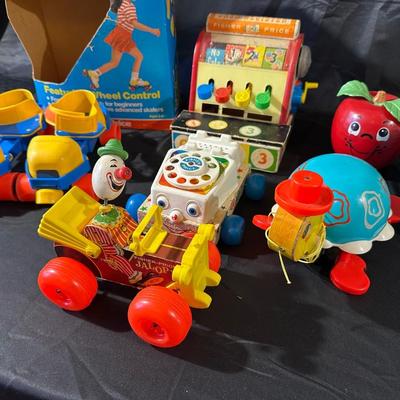 Lot of Vintage Fisher Price Toys including Roller Skates!
