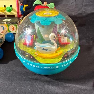 Lot of Vintage Fisher Price Toys including Roller Skates!