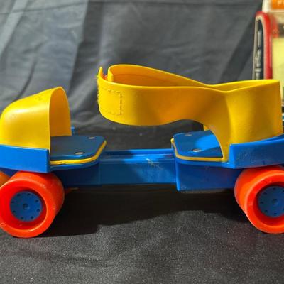 Lot of Vintage Fisher Price Toys including Roller Skates!