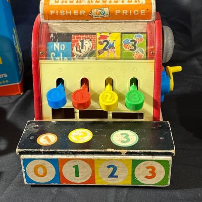 Lot of Vintage Fisher Price Toys including Roller Skates!