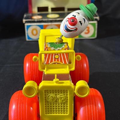 Lot of Vintage Fisher Price Toys including Roller Skates!