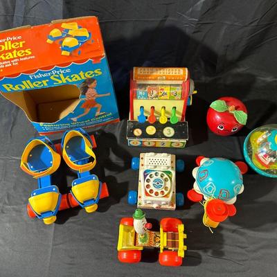 Lot of Vintage Fisher Price Toys including Roller Skates!