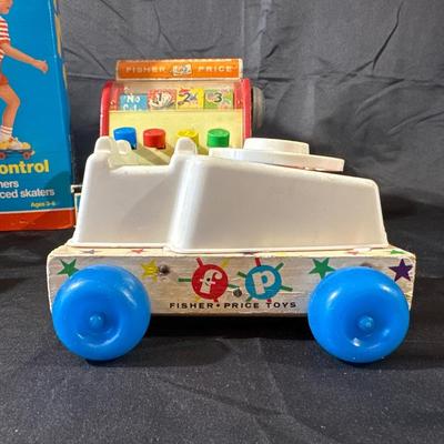 Lot of Vintage Fisher Price Toys including Roller Skates!