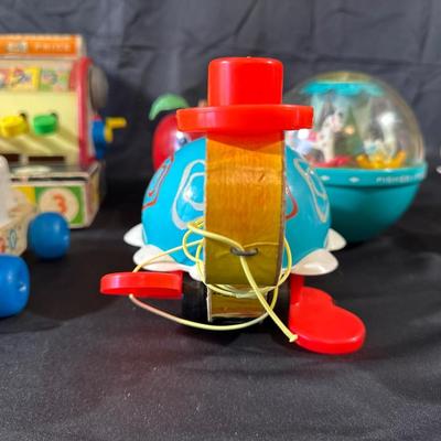 Lot of Vintage Fisher Price Toys including Roller Skates!