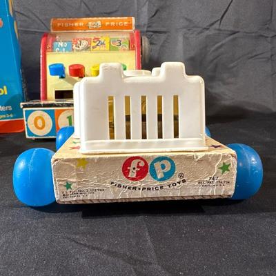Lot of Vintage Fisher Price Toys including Roller Skates!