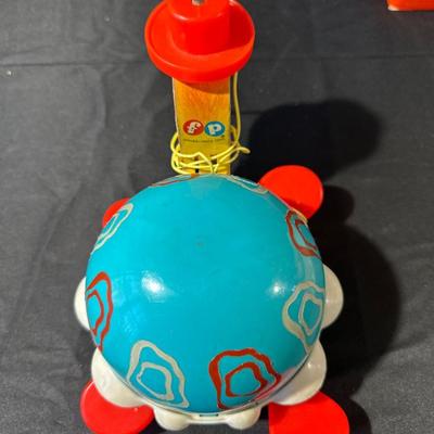 Lot of Vintage Fisher Price Toys including Roller Skates!