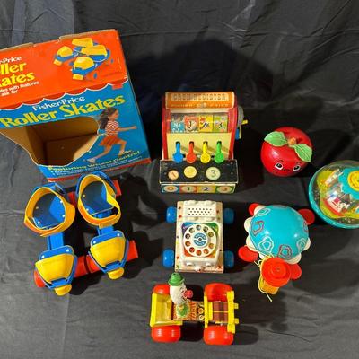 Lot of Vintage Fisher Price Toys including Roller Skates!