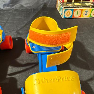 Lot of Vintage Fisher Price Toys including Roller Skates!