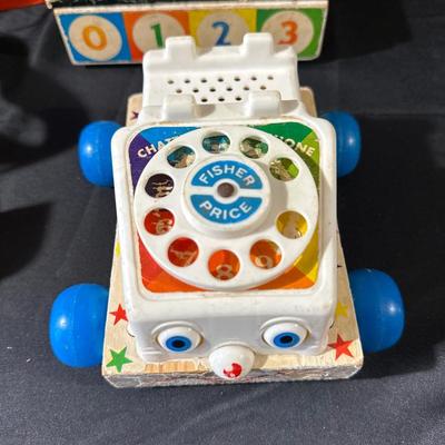 Lot of Vintage Fisher Price Toys including Roller Skates!