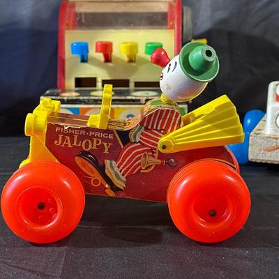 Lot of Vintage Fisher Price Toys including Roller Skates!