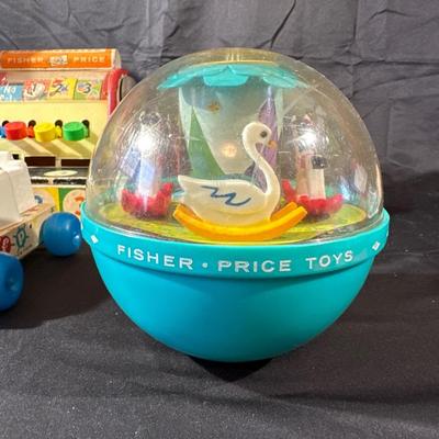 Lot of Vintage Fisher Price Toys including Roller Skates!
