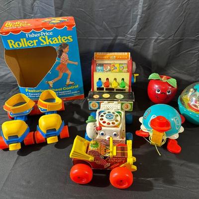 Lot of Vintage Fisher Price Toys including Roller Skates!