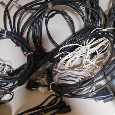 Lots and lots of cords and a zip reader and a floppy reader and a disk drive