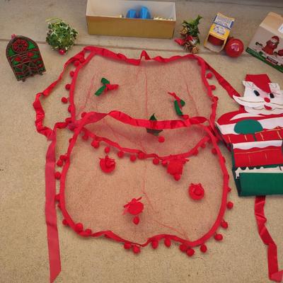 SHEER APRONS, HANGING SANTA, STAINED GLASS CANDLE HOLDER AND MORE