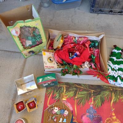 CHRISTMAS DECOR, STOCKINGS, RED LIGHT BULBS, RUG, ROPE LIGHT AND BOWS