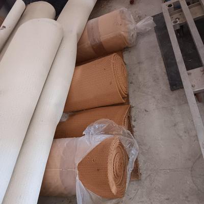 ROLLS OF CARPET REMNANTS AND PADDING