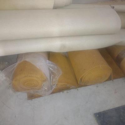 ROLLS OF CARPET REMNANTS AND PADDING