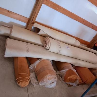 ROLLS OF CARPET REMNANTS AND PADDING