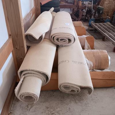 ROLLS OF CARPET REMNANTS AND PADDING