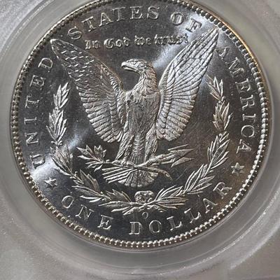 SEGS CERTIFIED 1898-O MS63 PROOF LIKE MORGAN SILVER DOLLAR AS PICTURED. SCARCE "O" FULL STRIKE COIN.