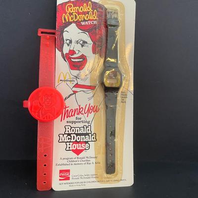 LOT 5: All Things Ronald McDonald Featuring Ronald McDonald Graphic Tee Shirt, Back to School Book Covers, Pencils, Miniature Dolls and...