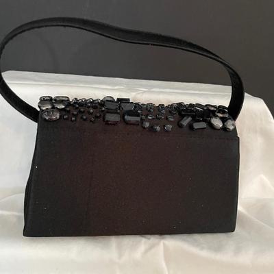 LOT 7: Evening Purses Galore Featuring a Gorgeous Vintage Blue Suede Evening Purse With Braided Gold tone Chain, Pair of Silvertone...