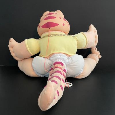 LOT 11: Adorable Cabbage Patch Doll with Adoption Papers and Baby Sinclair Talking Dinosaur (see pictures)
