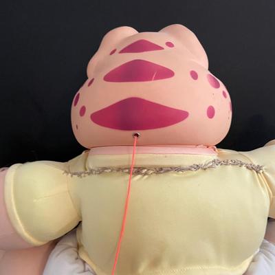 LOT 11: Adorable Cabbage Patch Doll with Adoption Papers and Baby Sinclair Talking Dinosaur (see pictures)