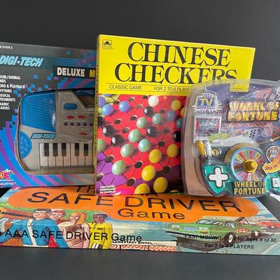 LOT 21: Vintage Triple AAA Safe Driver Board Game, Chinese Checkers (all Game Pieces Present), NIP Wheel of Fortune. NIP Melody Keyboard