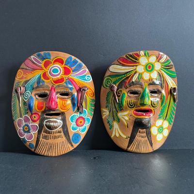 LOT:22 Colorful Collection of Hand Carved Tropical Beach Scenes and Two (2) Vibrant Hand Painted Folk Art Masks