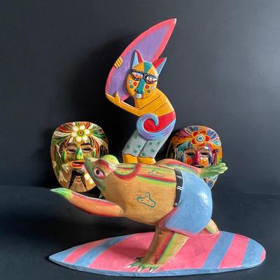 LOT:22 Colorful Collection of Hand Carved Tropical Beach Scenes and Two (2) Vibrant Hand Painted Folk Art Masks