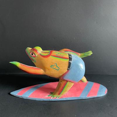 LOT:22 Colorful Collection of Hand Carved Tropical Beach Scenes and Two (2) Vibrant Hand Painted Folk Art Masks