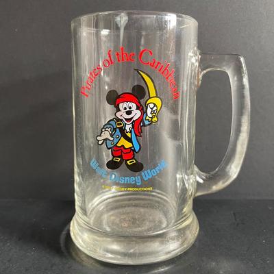 LOT 24: Winnie the Pooh & Piglet Souvenir Mugs (4.5”H), and Five (5) Vintage Glass Mugs of Assorted Disney Characters by Walt Disney...