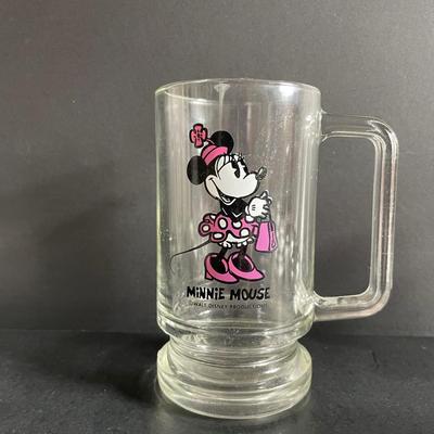 LOT 24: Winnie the Pooh & Piglet Souvenir Mugs (4.5”H), and Five (5) Vintage Glass Mugs of Assorted Disney Characters by Walt Disney...