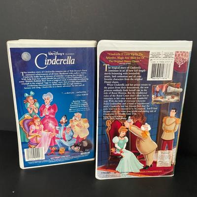 LOT 25: Vintage Cinderella and Cinderella II VHS Tapes with a Collector’s Edition Reproduction of an Animation Sketch from Cinderella...